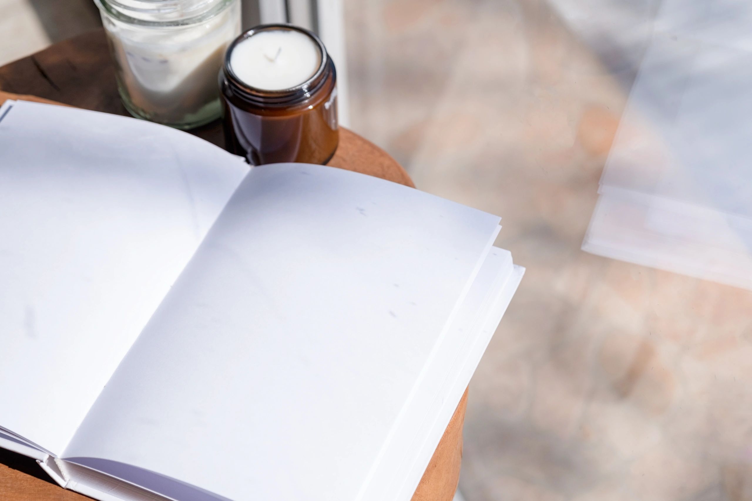Book and journal styled on a table for ministry resources