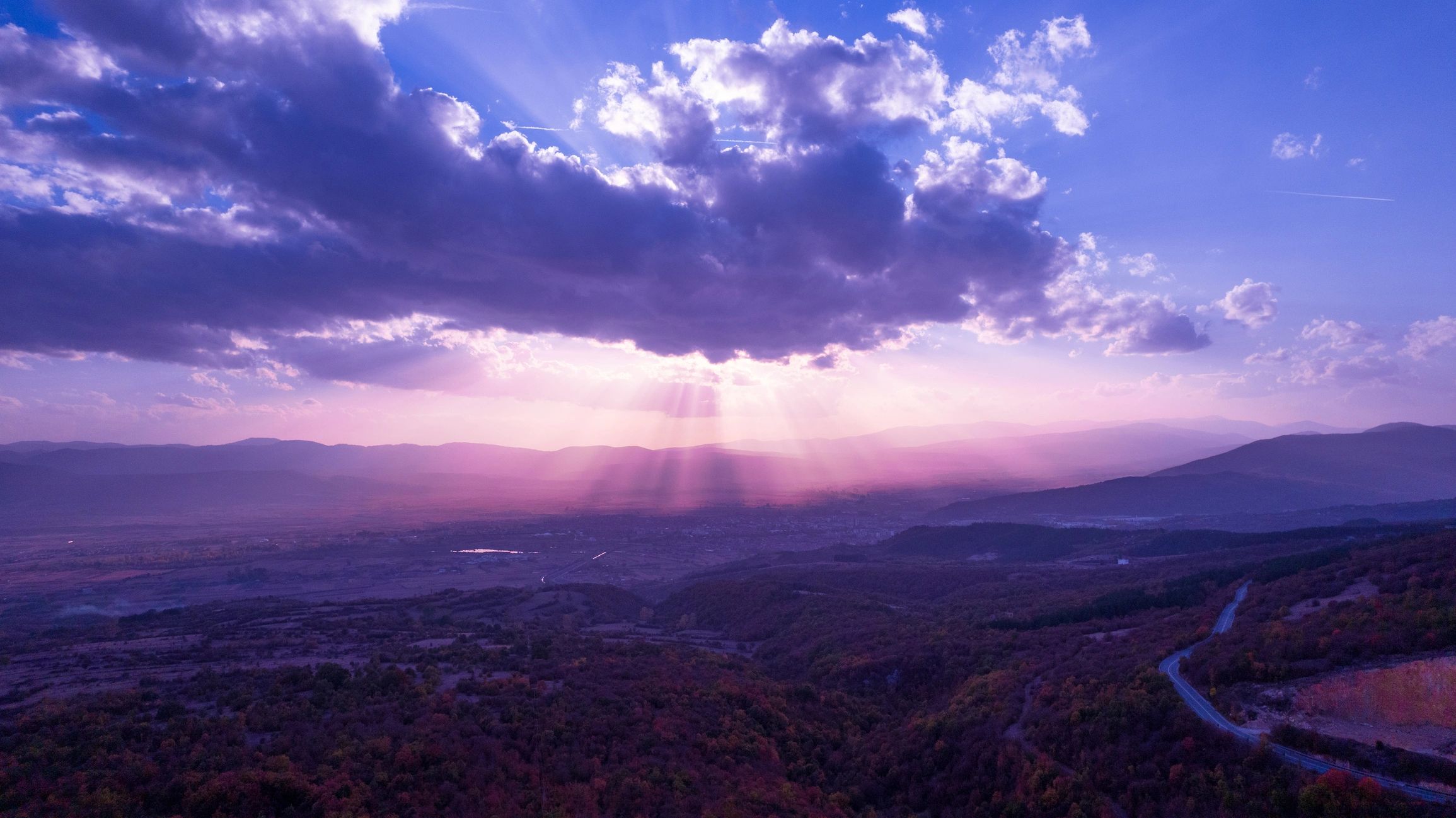 Sunbeams through clouds representing worship and spiritual encouragement