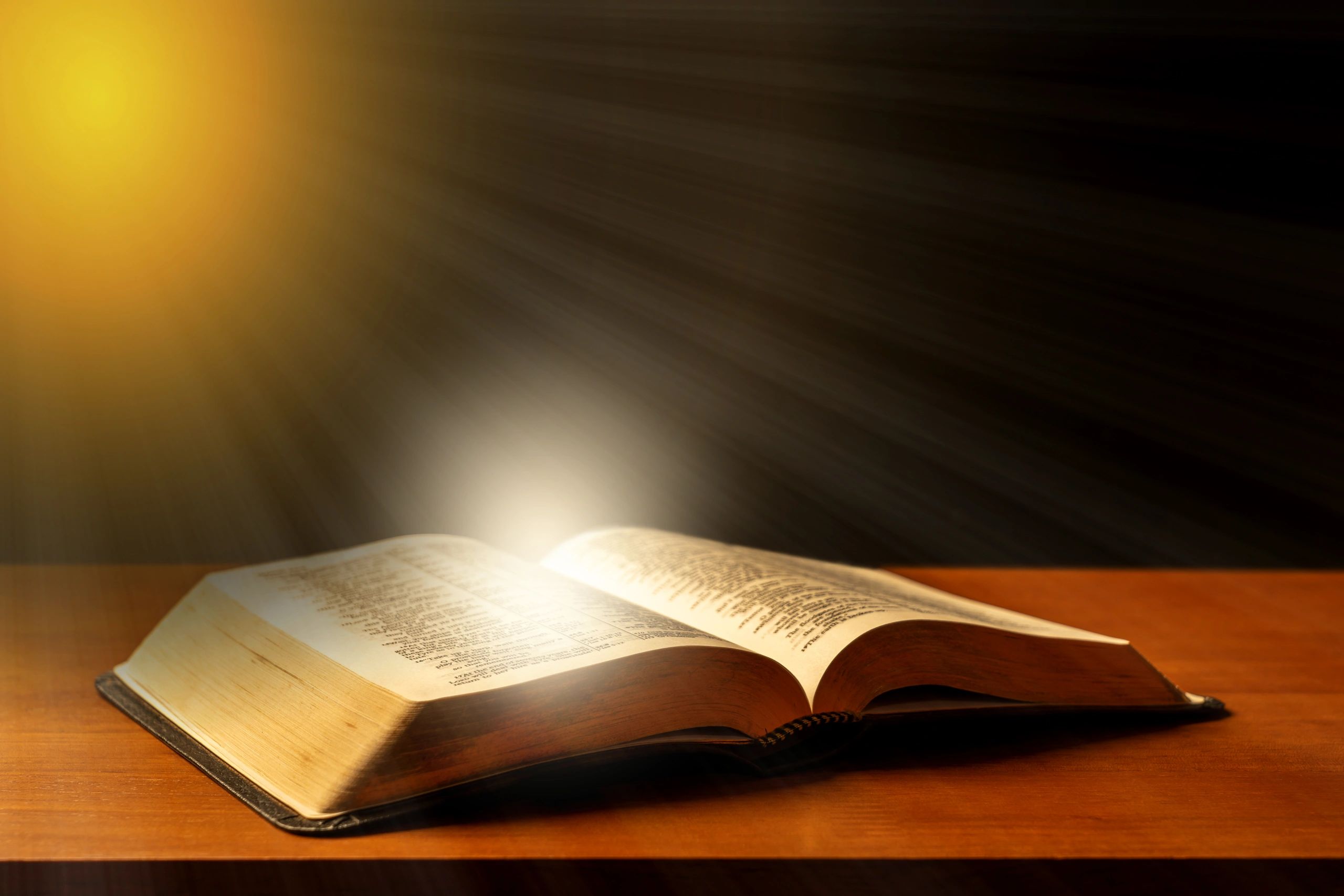 Open Bible with dramatic light